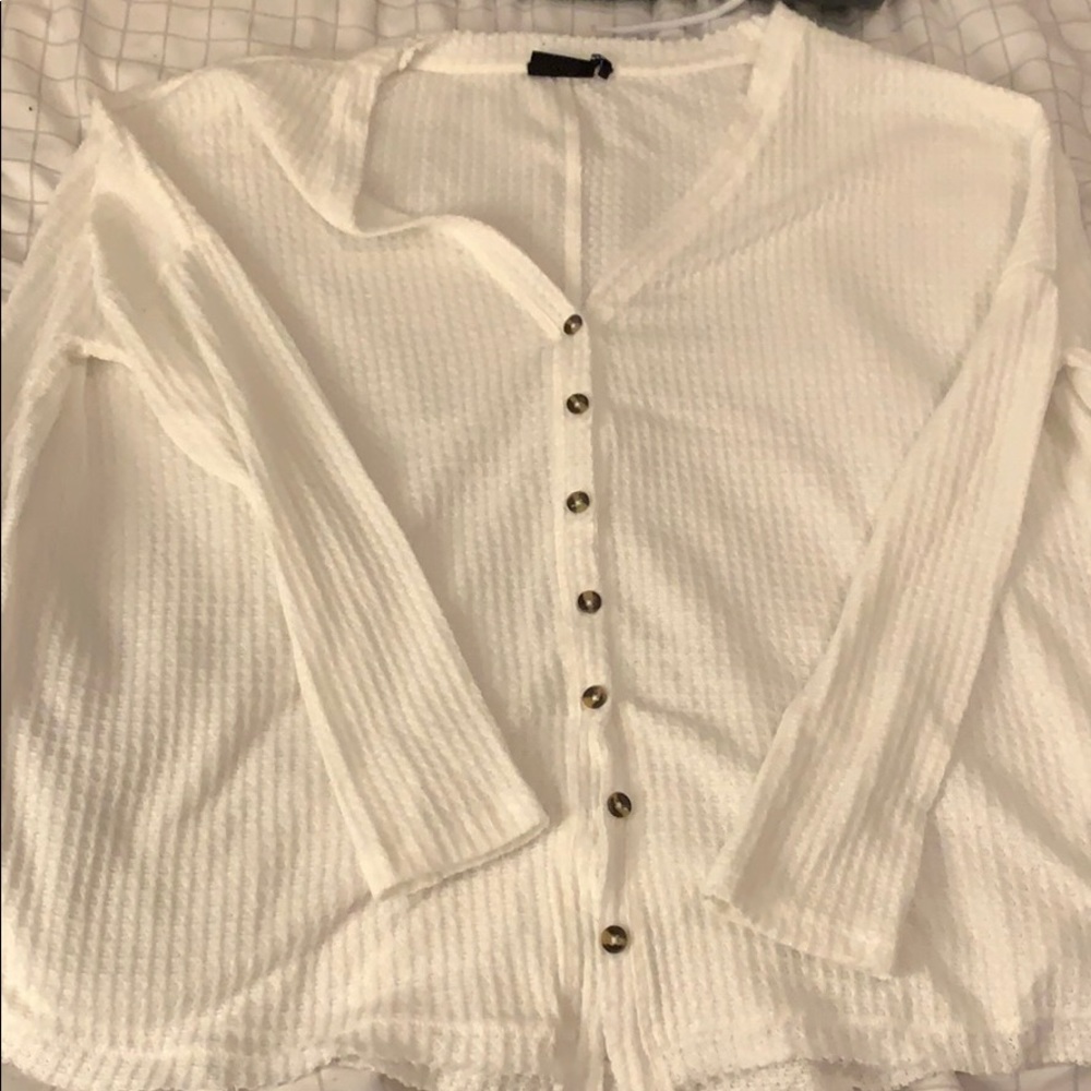 White long sleeve sweater with buttons